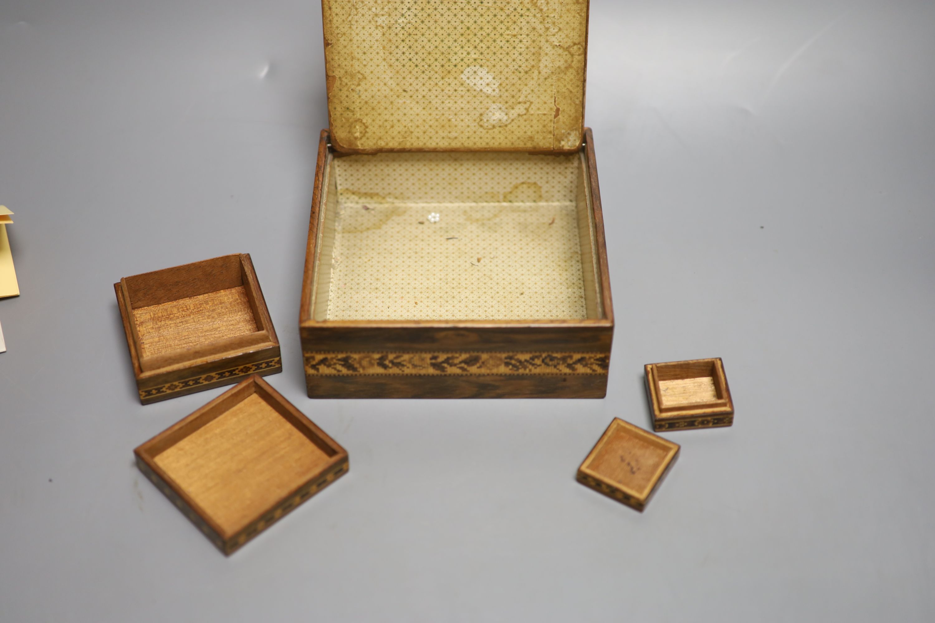 A Tunbridge Ware rosewood handkerchief box, with foliate and geometric inlay and three other items, 15.5cm square (largest)